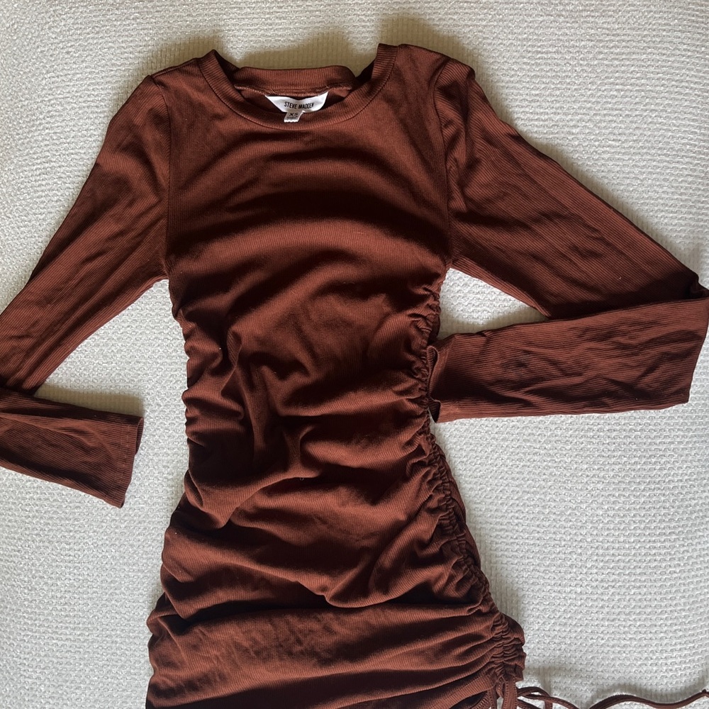#1 Crush Mini Dress in Chicory Coffee
by STEVE MADDEN. sold out online.